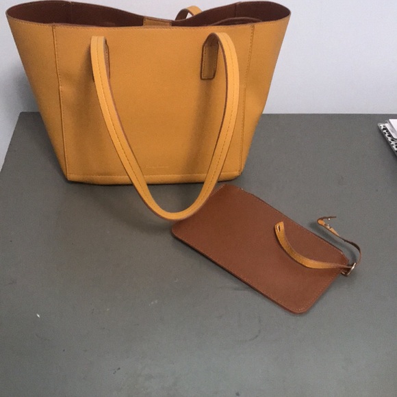 Tommy Bahama Reversible Faux Leather Tote Wristlet - Picture 5 of 16